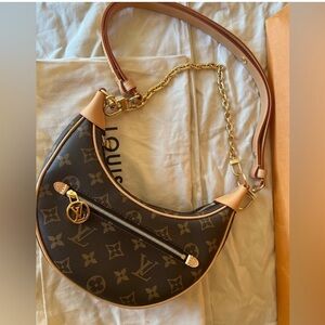 Louis Vuitton  half-moon strap .. NEW NEVER WORN